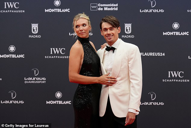 Alex meanwhile cut a dapper figure in a white jacket and smart black bow tie as he posed with his stunning girlfriend