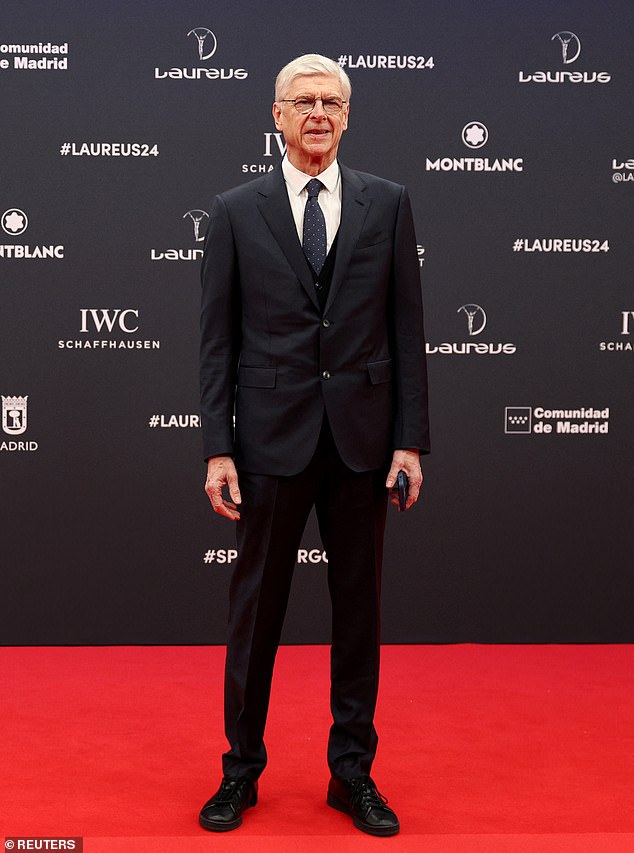 FIFA's Chief of Global Football Development Arsene Wenger wore a black suit