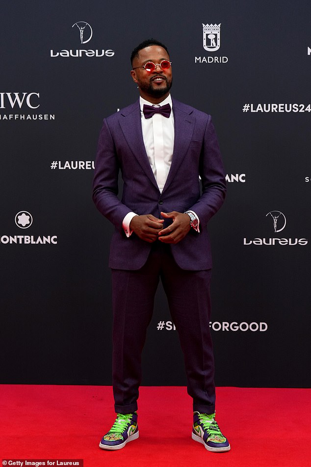 French former professional footballer Patrice Evra wore a purple suit