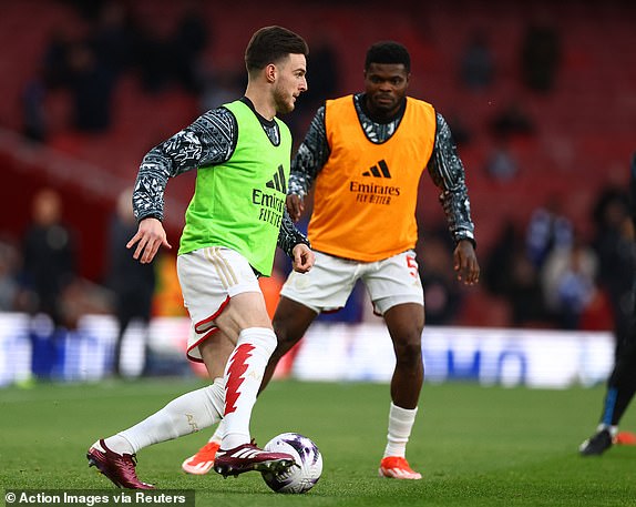 Soccer Football - Premier League - Arsenal v Chelsea - Emirates Stadium, London, Britain - April 23, 2024 Arsenal's Declan Rice and Thomas Partey during the warm up before the match Action Images via Reuters/Matthew Childs NO USE WITH UNAUTHORIZED AUDIO, VIDEO, DATA, FIXTURE LISTS, CLUB/LEAGUE LOGOS OR 'LIVE' SERVICES. ONLINE IN-MATCH USE LIMITED TO 45 IMAGES, NO VIDEO EMULATION. NO USE IN BETTING, GAMES OR SINGLE CLUB/LEAGUE/PLAYER PUBLICATIONS.