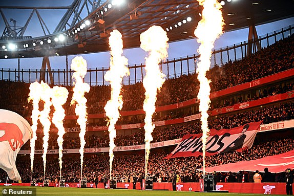 Soccer Football - Premier League - Arsenal v Chelsea - Emirates Stadium, London, Britain - April 23, 2024 General view of a pyrotechnic display inside the stadium before the match REUTERS/Dylan Martinez NO USE WITH UNAUTHORIZED AUDIO, VIDEO, DATA, FIXTURE LISTS, CLUB/LEAGUE LOGOS OR 'LIVE' SERVICES. ONLINE IN-MATCH USE LIMITED TO 45 IMAGES, NO VIDEO EMULATION. NO USE IN BETTING, GAMES OR SINGLE CLUB/LEAGUE/PLAYER PUBLICATIONS.