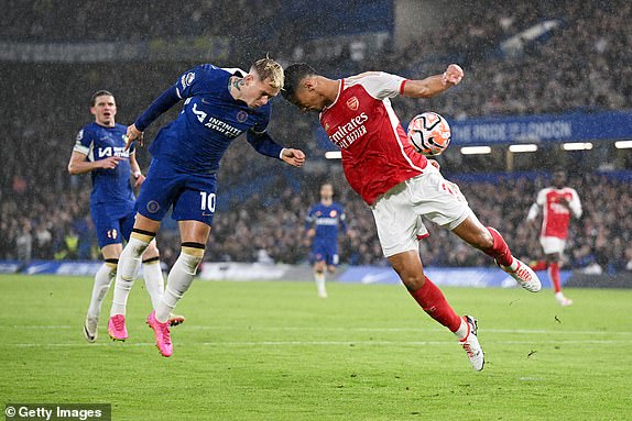 LONDON, ENGLAND - OCTOBER 21: Mykhaylo Mudryk of Chelsea clashes with William Saliba of Arsenal during the Premier League match between Chelsea FC and Arsenal FC at Stamford Bridge on October 21, 2023 in London, England. (Photo by Michael Regan/Getty Images)