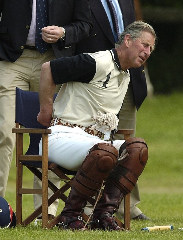 King Charles wincing in pain after a game of polo at Hurtwood Park in Surrey in 2004