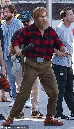 The Canadian 53-year-old funnyman and his double were both dressed as axe-wielding lumberjacks from Supercell game Hay Day Pop