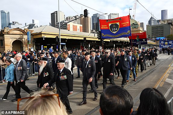 Participants are seen during the Anzac Day march in Melbourne, Thursday, April 25, 2024. (AAP Image/Con Chronis) NO ARCHIVING