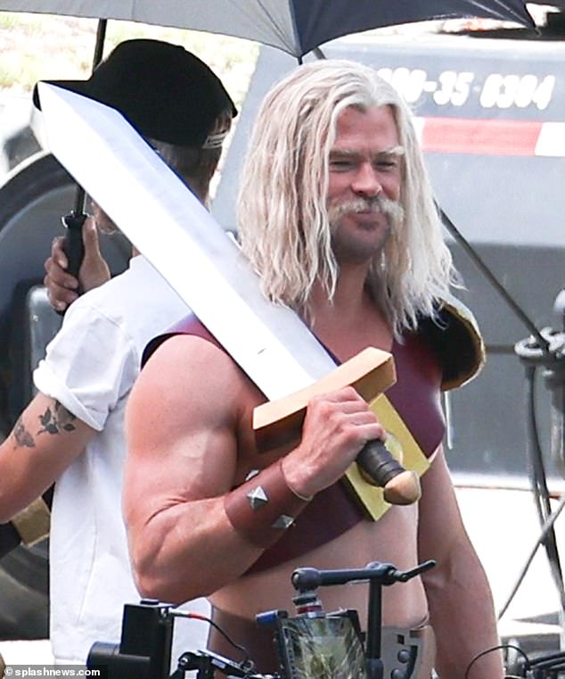 On Monday, Chris Hemsworth ditched his elegant, ornate-looking Thor costume in favor of a more cartoon-ish Barbarian get-up while on the Los Angeles set of a commercial for Clash of Clans
