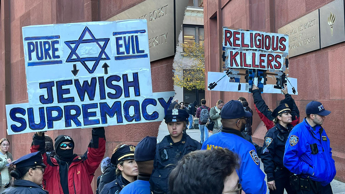 NYU-Demonstrant jüdisches Vorherrschaftszeichen