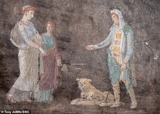 Painted onto a black background, the scene shows Helen of Troy, a beautiful woman in Greek mythology (left with a nurse or maid), meeting Paris, prince of Troy (right with his dog). The little Greek writing says: Alexander Helen. Alexander is another name for Paris