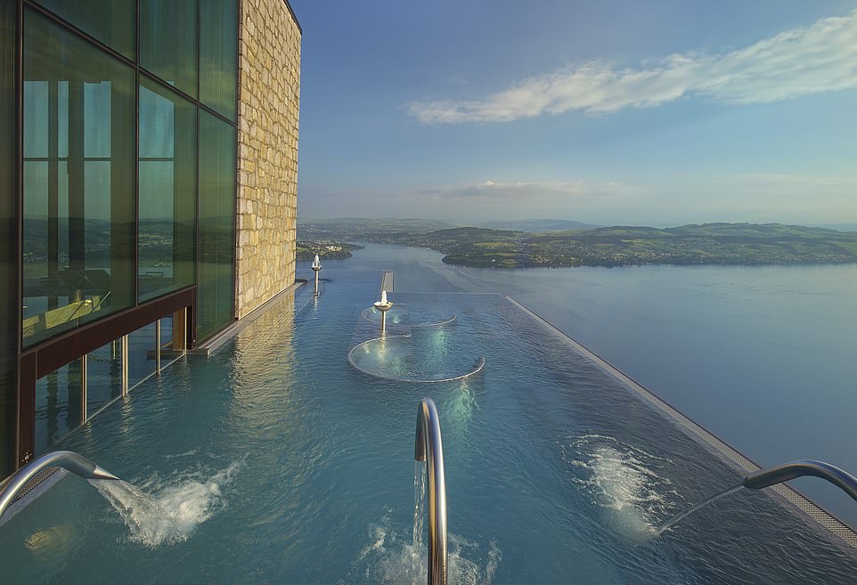 MailOnline Travel's Ian Walker checked in to the Burgenstock Hotel and Alpine Spa, which sits spectacularly 500 metres (1,640ft) above Lake Lucerne. Above is the hotel's incredible spa infinity pool