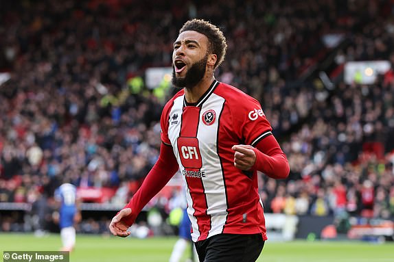 SHEFFIELD, ENGLAND - APRIL 07: Jayden Bogle of Sheffield United celebrates scoring his team's first goal during the Premier League match between Sheffield United and Chelsea FC at Bramall Lane on April 07, 2024 in Sheffield, England. (Photo by Jan Kruger/Getty Images)