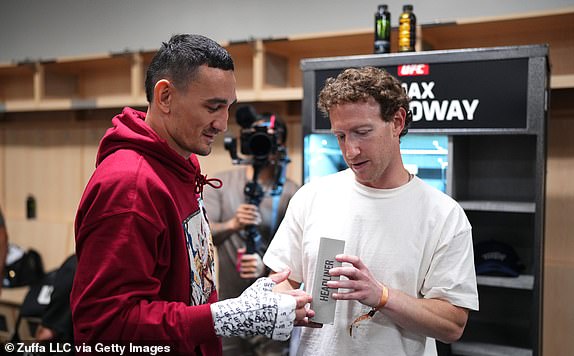 LAS VEGAS, NEVADA - APRIL 13: (L-R) Max Holloway and Mark Zuckerberg backstage during the UFC 300 event at T-Mobile Arena on April 13, 2024 in Las Vegas, Nevada.  (Photo by Cooper Neill/Zuffa LLC via Getty Images)