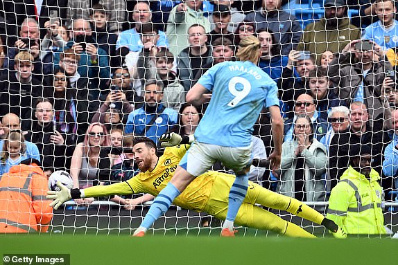 MANCHESTER, ENGLAND - MAY 04: Jose Sa of Wolverhampton Wanderers fails to make a save as Erling Haaland of Manchester City scores his team's third goal from the penalty spot during the Premier League match between Manchester City and Wolverhampton Wanderers at Etihad Stadium on May 04, 2024 in Manchester, England. (Photo by Michael Regan/Getty Images)