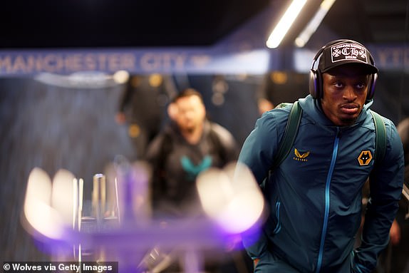 MANCHESTER, ENGLAND - MAY 04: Toti Gomes of Wolverhampton Wanderers arrives at the stadium ahead of the Premier League match between Manchester City and Wolverhampton Wanderers at Etihad Stadium on May 04, 2024 in Manchester, England. (Photo by Jack Thomas - WWFC/Wolves via Getty Images)