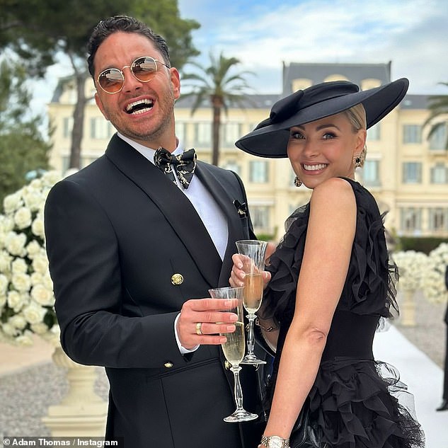 Der ehemalige Star von Strictly Come Dancing, Adam Thomas, 35, machte in einem schwarzen Anzug einen eleganten Look, während seine Frau Caroline in einem schwarzen Tüllkleid und Kopfschmuck schick aussah