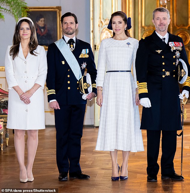 Carl Philip's wife Princess Sofia put on a stylish display, meanwhile, in a white Veronica Virta dress teamed with a matching headband and heels
