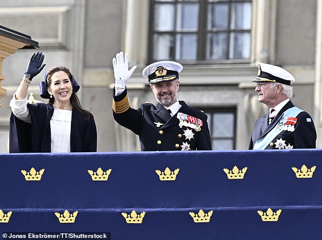 Australian-born Mary (pictured left), 52, was the epitome of elegance in a white dress and royal blue shawl, while her beaming husband looked handsome in his military uniform