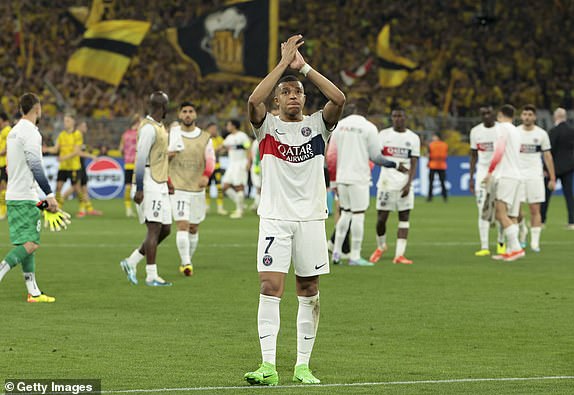 DORTMUND, GERMANY - MAY 1: Kylian Mbappe of PSG salutes the supporters following the UEFA Champions League semi-final first leg match between Borussia Dortmund (BVB) and Paris Saint-Germain (PSG) at Signal Iduna Park on May 1, 2024 in Dortmund, Germany.(Photo by Jean Catuffe/Getty Images)