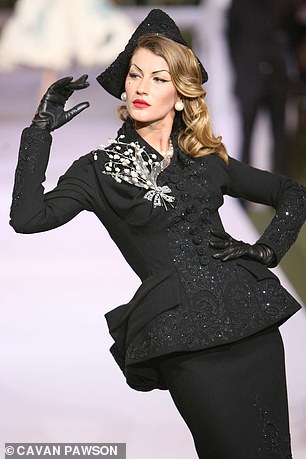 Gisele Bundchen wearing an outfit inspired by Irin Penn part of the Christian Dior collection designed by John Galliano
