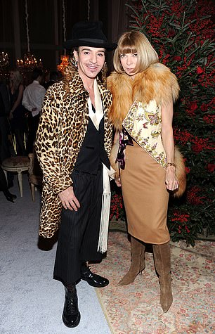 John Galliano and Anna Wintour attend the Dior celebration of the reopening of its 57th Street Boutique - Dinner at LVMH Tower Magic Room on December 8, 2010 in New York City