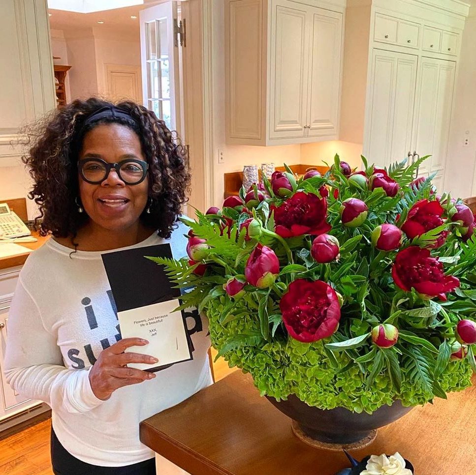 Oprah mit ein paar Blumen