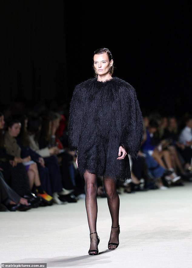 On the runway, model Montana Cox had the audience gasping when she hit the runway in faux fur look with glitter details. Pictured