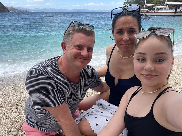 Georgie Palmer (centre), 49, her husband Nick Sollom (left), 48, and daughters Rosie (right), 12, and Annie, 14, were ordered off the flight after they asked passengers to not to eat peanuts because of her daughter's allergy