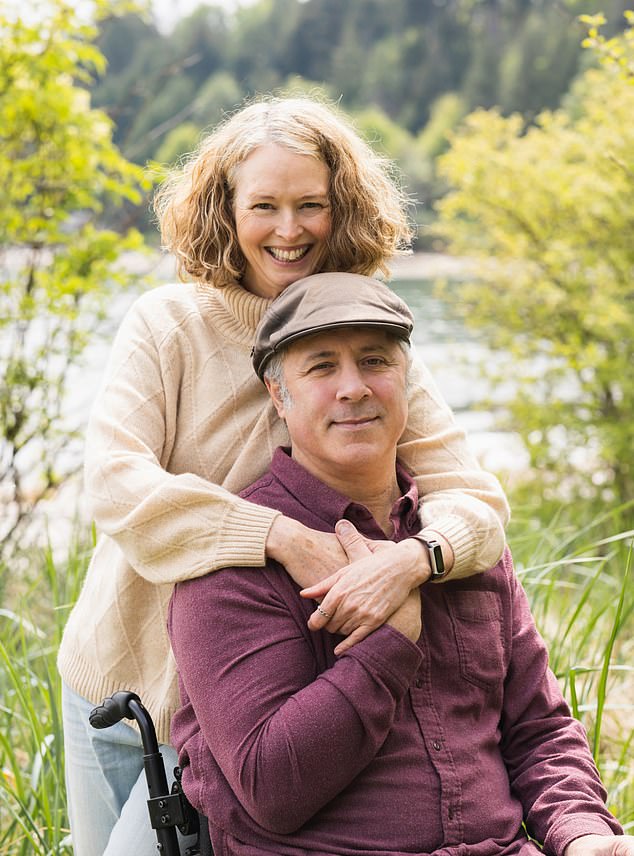 Kara Stanley with her husband Simon, who in 2008 fell off an unsecured second-storey scaffold, suffering catastrophic injuries to his brain and spinal cord