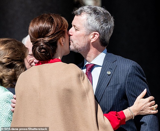 King Frederik of Denmark gave his wife Queen Mary a sweet kiss on the cheek during the royal state visit to Sweden on Tuesday