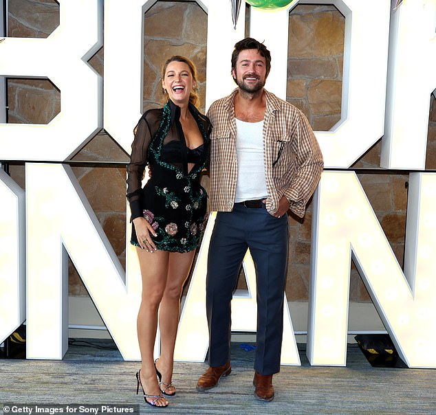 Both he and Blake - who plays Lily Bloom in the movie - stopped to take a few memorable photos together while on the stage, and also in front of a 'Book Bonanza' sign inside the venue