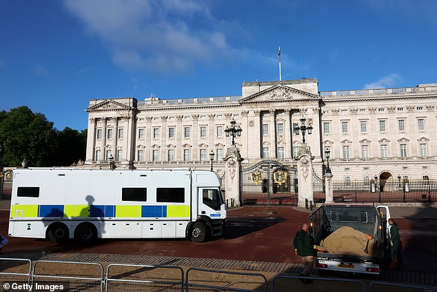 A Metropolitan Police van outside Buckingham Palace today before Trooping the Colour