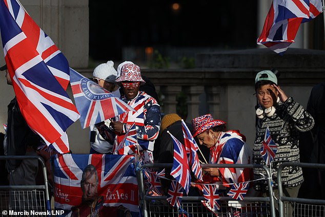 Royal fans start to gather on The Mall in London this morning ahead of Trooping The Colour