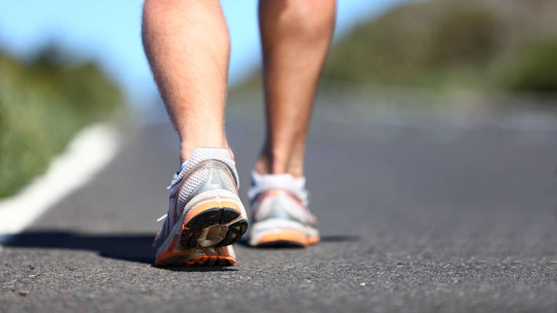 There is a close-up of a man running. 