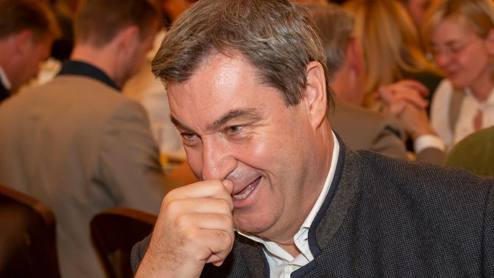 A smiling Markus Söder in the beer tent