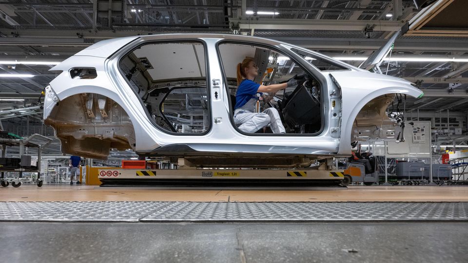 A car model of the new generation of the ID.3 is assembled at the Volkswagen factory in Zwickau