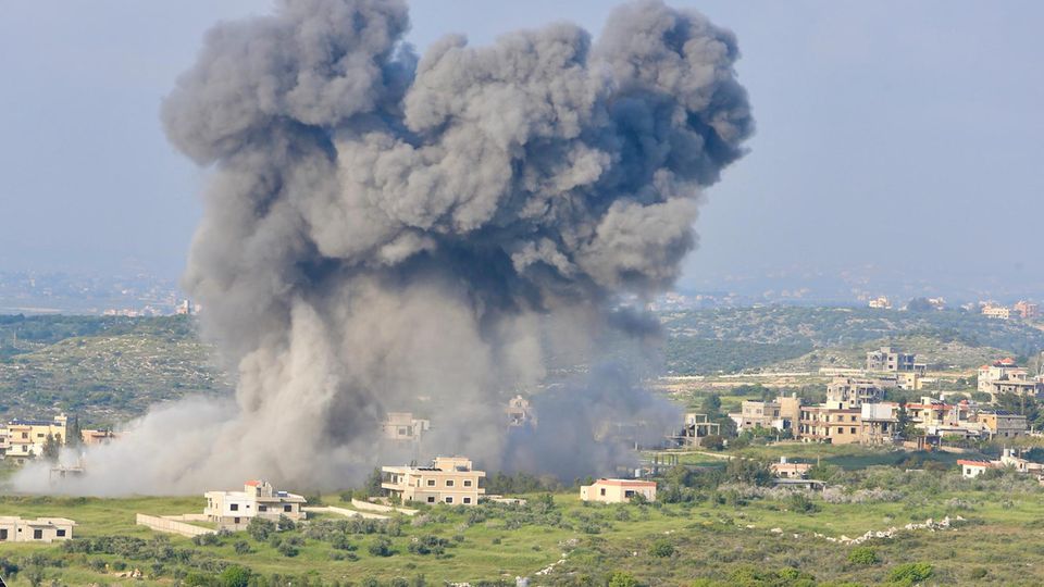 Smoke rises over Majdal Zun, a village in southern Lebanon, after an Israeli airstrike