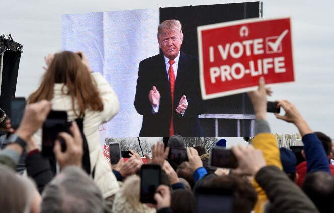 Pro-life demonstrators listen to US President Donald Trump during his speech at the 47th “March for Life” in Washington, January 24, 2020.