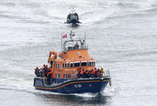 Migrants rescued by a British rescue boat, shortly before their arrival at the port of Dover, Great Britain, April 23, 2024. 