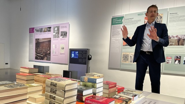 Contemporary history: Seven years ago in Nuremberg, curator Alexander Schmidt called for the old Speer books to be taken off the shelves.  Several stacks of them are now part of the special exhibition at Obersalzberg.