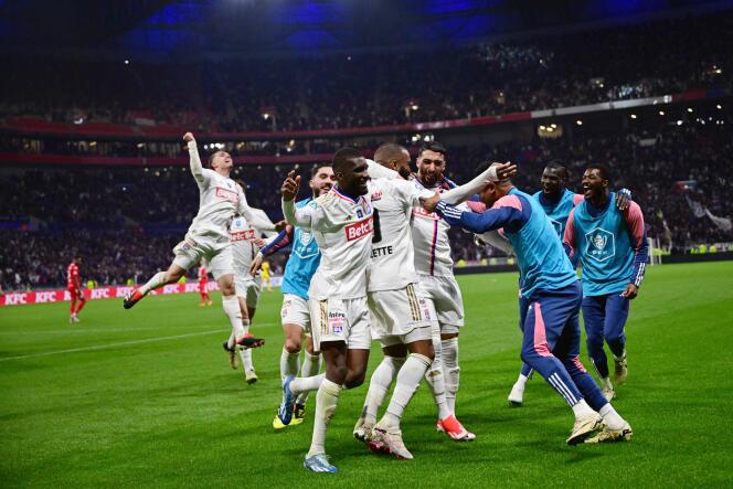 The Olympique Lyonnais team celebrates a goal against Valenciennes, in Décines-Charpieu, near Lyon, on April 2, 2024.