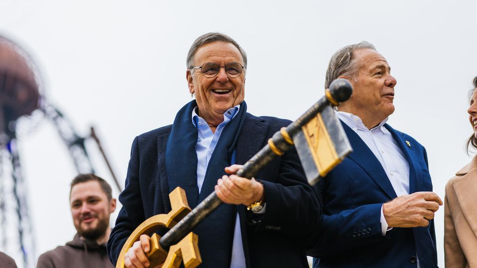 Roland Mack, shareholder of Europapark, holds the key to opening the newest roller coaster.
