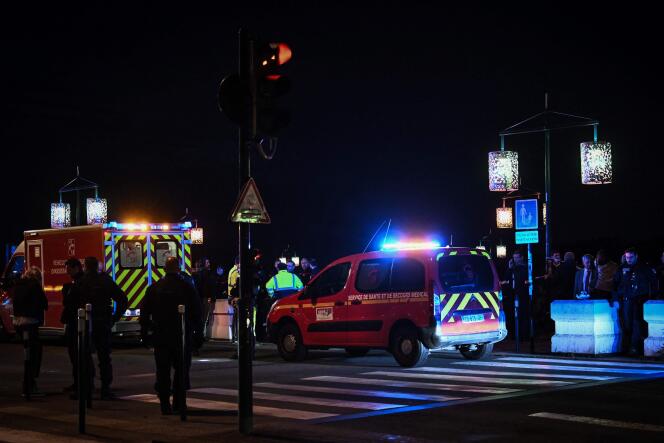 Police and firefighters in Bordeaux near the scene where a man killed one person and injured another, before being shot dead by police, April 10, 2024.