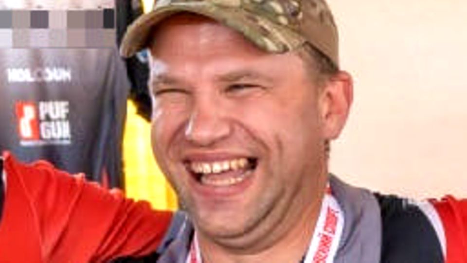 Yuri Schikolenko at the award ceremony of a shooting competition
