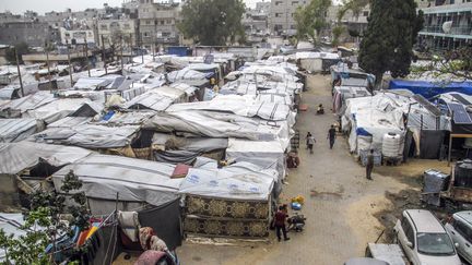 Palestinian refugees live in tents set up in the Jabalia camp, May 10, 2024. (MAHMOUD ASSA / ANADOLU AGENCE / AFP)