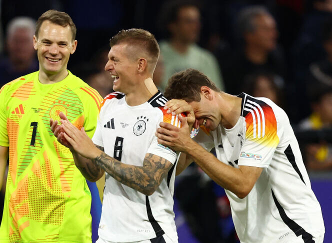Veterans of the German selection, Manuel Neuer (left), Toni Kroos (center) and Thomas Müller (right), after their victory against Scotland, in Munich, June 14, 2024.